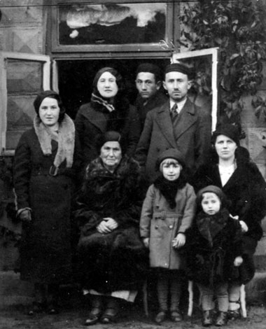 The Nissan Przybylski Family (back row, standing, from left): Chana, Sara, 