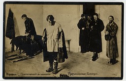 men_standing_prison-