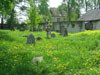 Our guide, Aleksandrs Feigmanis, entering the cemetery.
