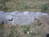Gravestone on side